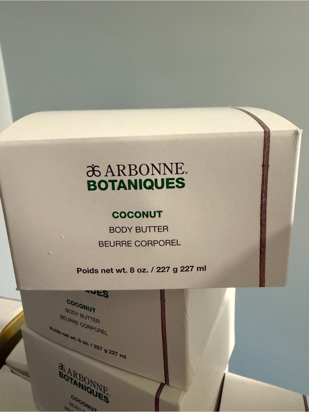 Arbonne Coconut Body Butter – White with Green and Brown Accents